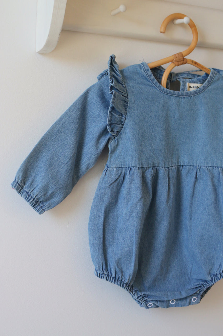 BLUE CHAMBRAY RUFFLE ROMPER