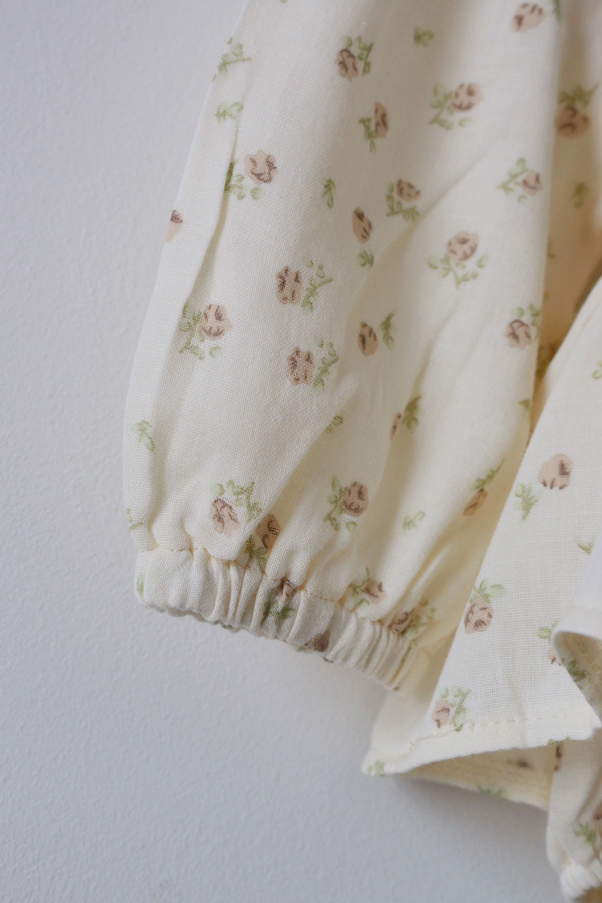 Floral-patterned fabric on a plain background