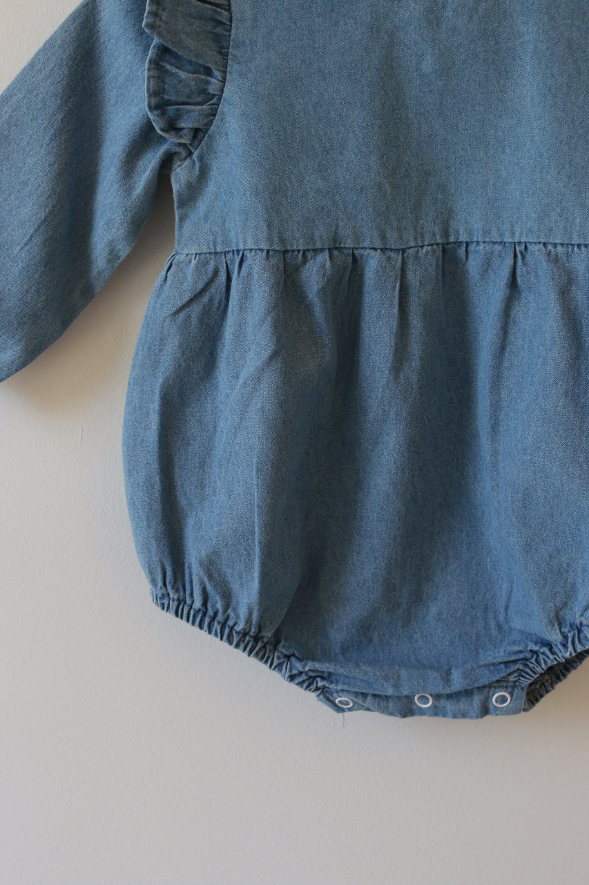 BLUE CHAMBRAY RUFFLE ROMPER