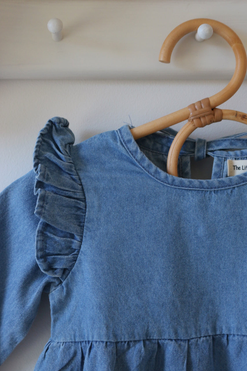 BLUE CHAMBRAY RUFFLE ROMPER