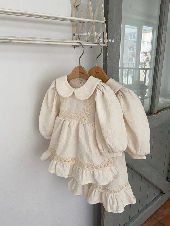 ENCHANTED SKIRTED BODYSUIT
