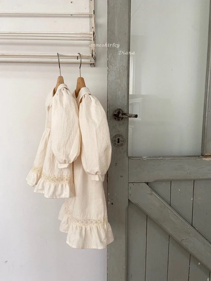 ENCHANTED SKIRTED BODYSUIT