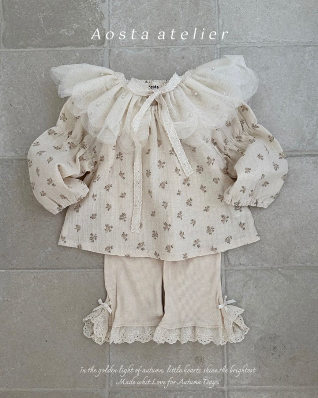 CREAM RIBBED COTTON FLARED PANTS