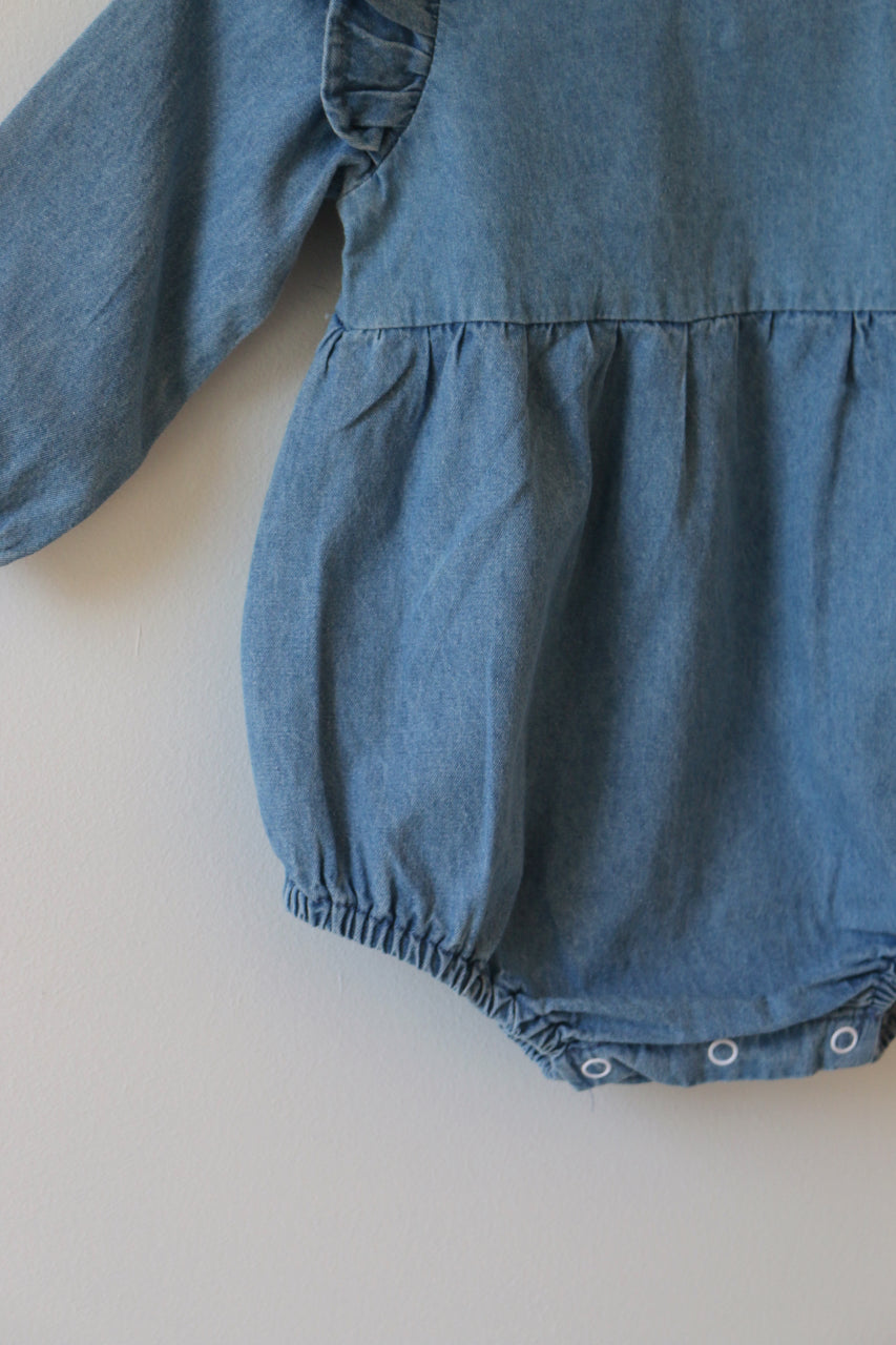 BLUE CHAMBRAY RUFFLE ROMPER