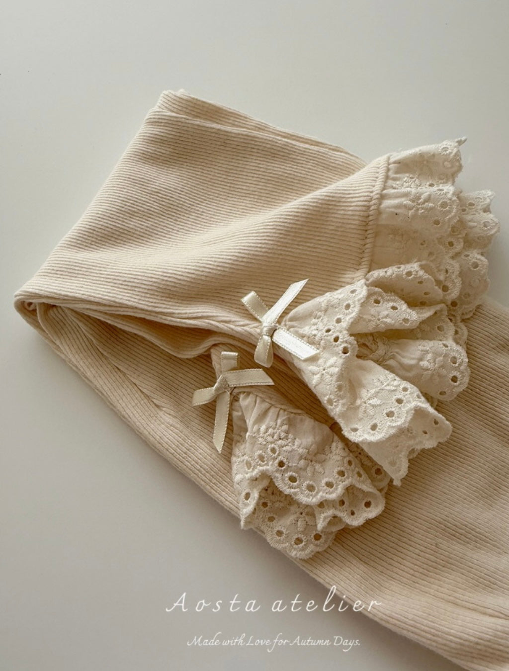 CREAM RIBBED COTTON FLARED PANTS