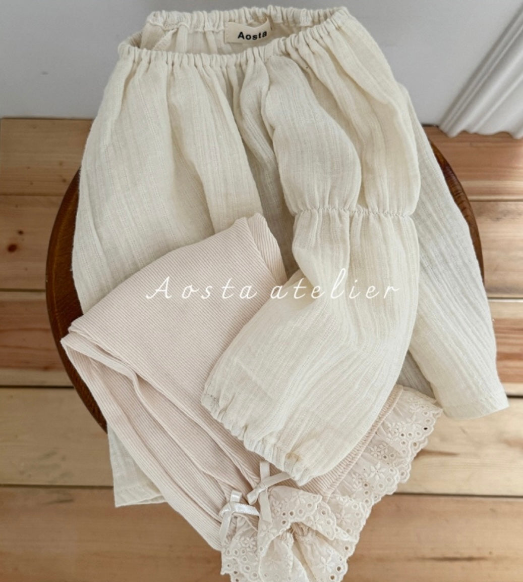 CREAM RIBBED COTTON FLARED PANTS