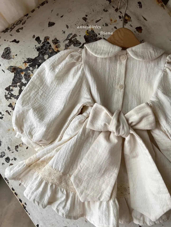 ENCHANTED SKIRTED BODYSUIT