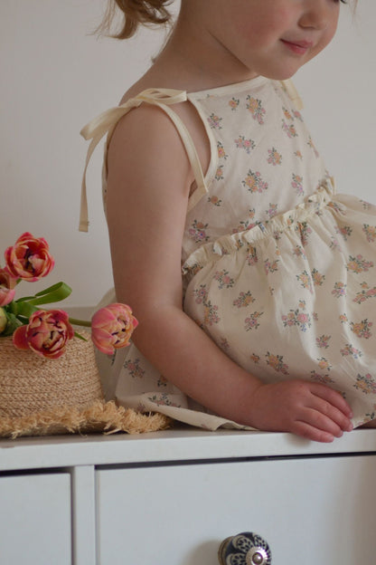 DAINTY FLORAL SKIRTED ROMPER