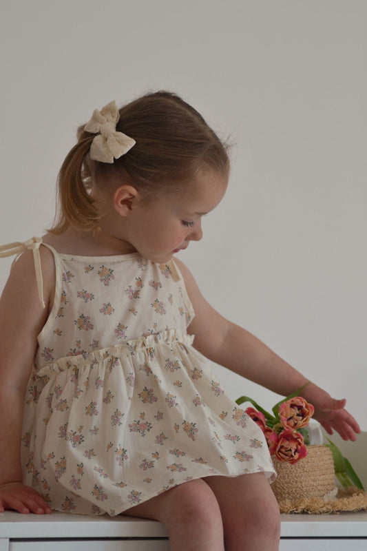 DAINTY FLORAL SKIRTED ROMPER