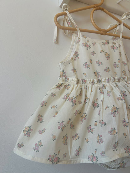DAINTY FLORAL SKIRTED ROMPER