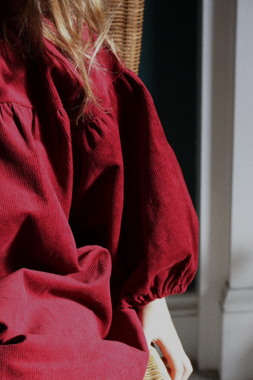 WINTER BERRY SMOCK NEEDLECORD DRESS