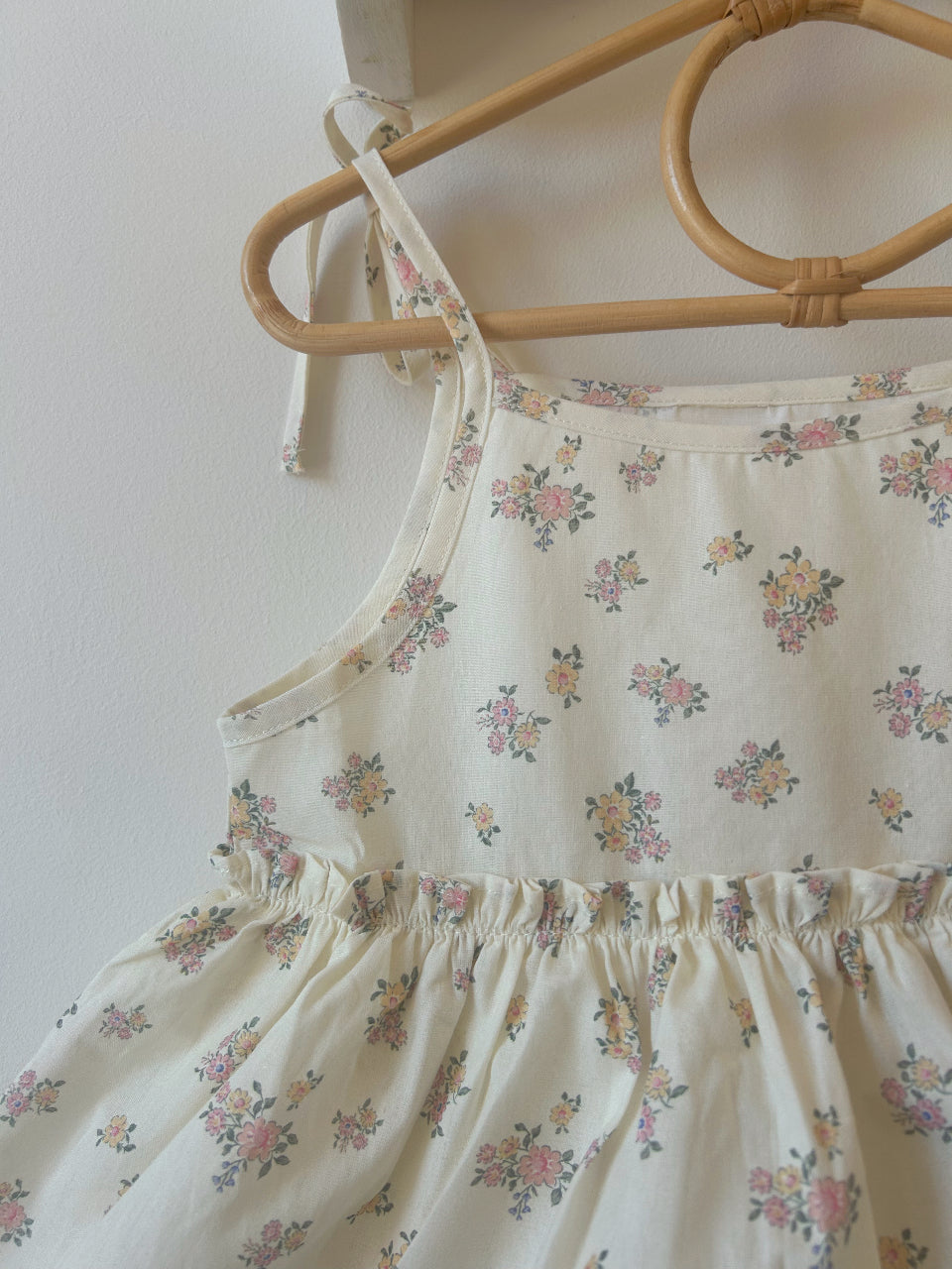 DAINTY FLORAL SKIRTED ROMPER