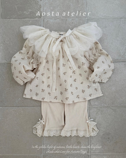 CREAM RIBBED COTTON FLARED PANTS