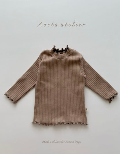 Brown ribbed top on a neutral background with 'Aosta atelier' branding.