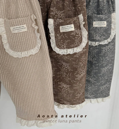 BROWN FLORAL CORDUROY TROUSERS WITH BRODERIE FRILL