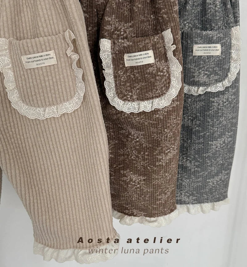 BEIGE CORDUROY TROUSERS WITH BRODERIE FRILL