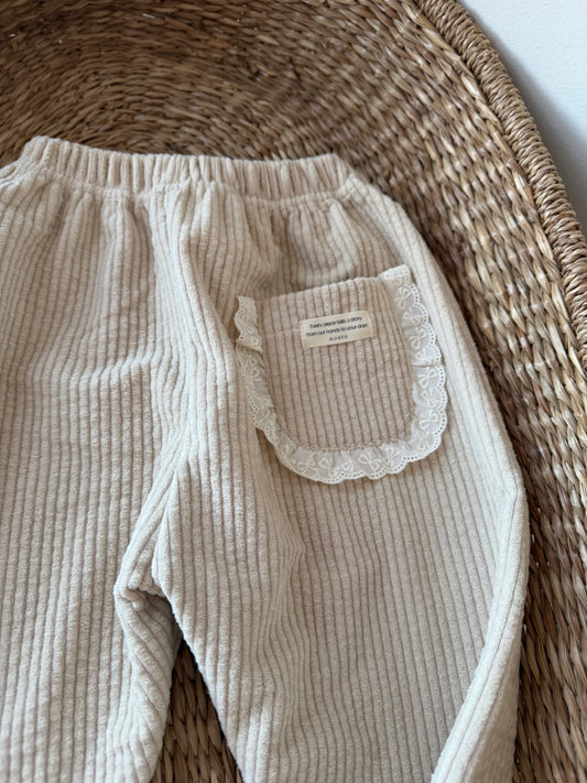 BEIGE CORDUROY TROUSERS WITH BRODERIE FRILL