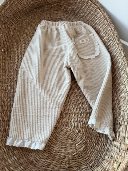 BEIGE CORDUROY TROUSERS WITH BRODERIE FRILL