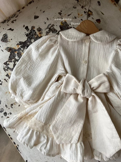 ENCHANTED SKIRTED BODYSUIT